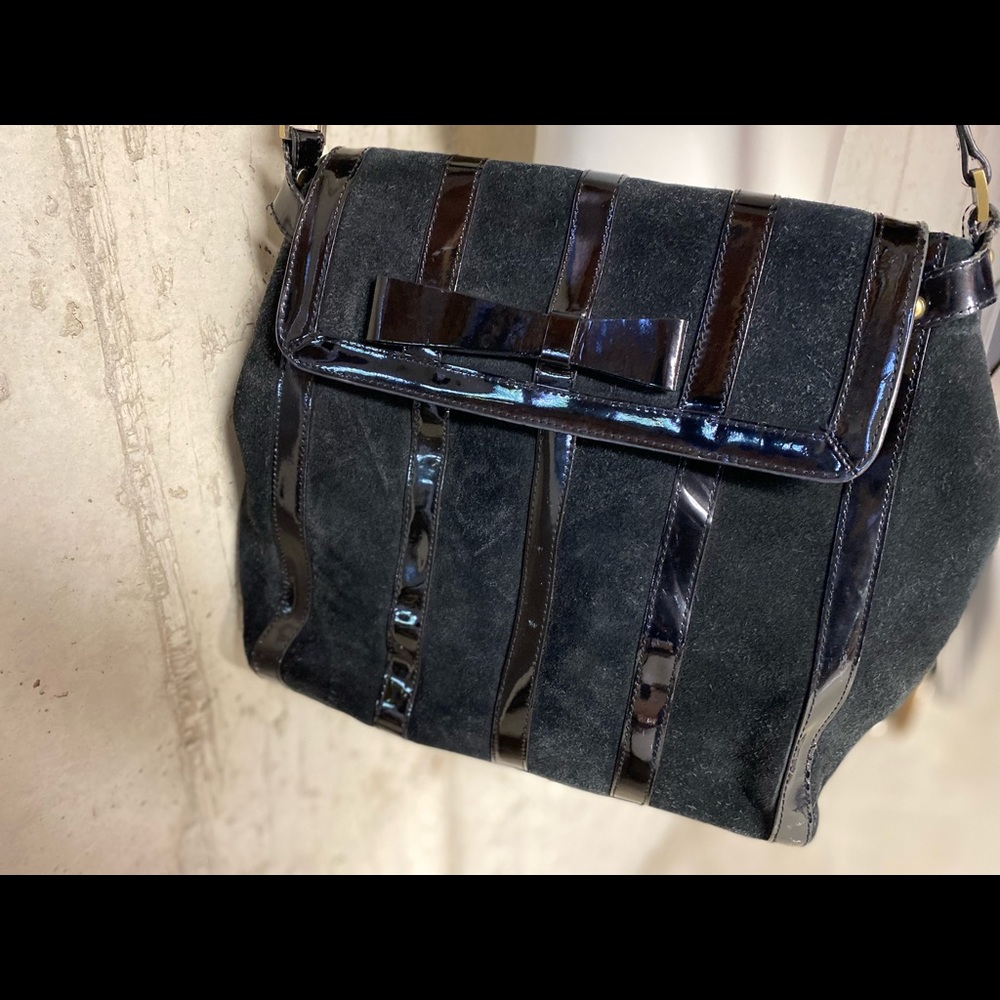 Trina Turk black suede and patent leather large shoulder bag
